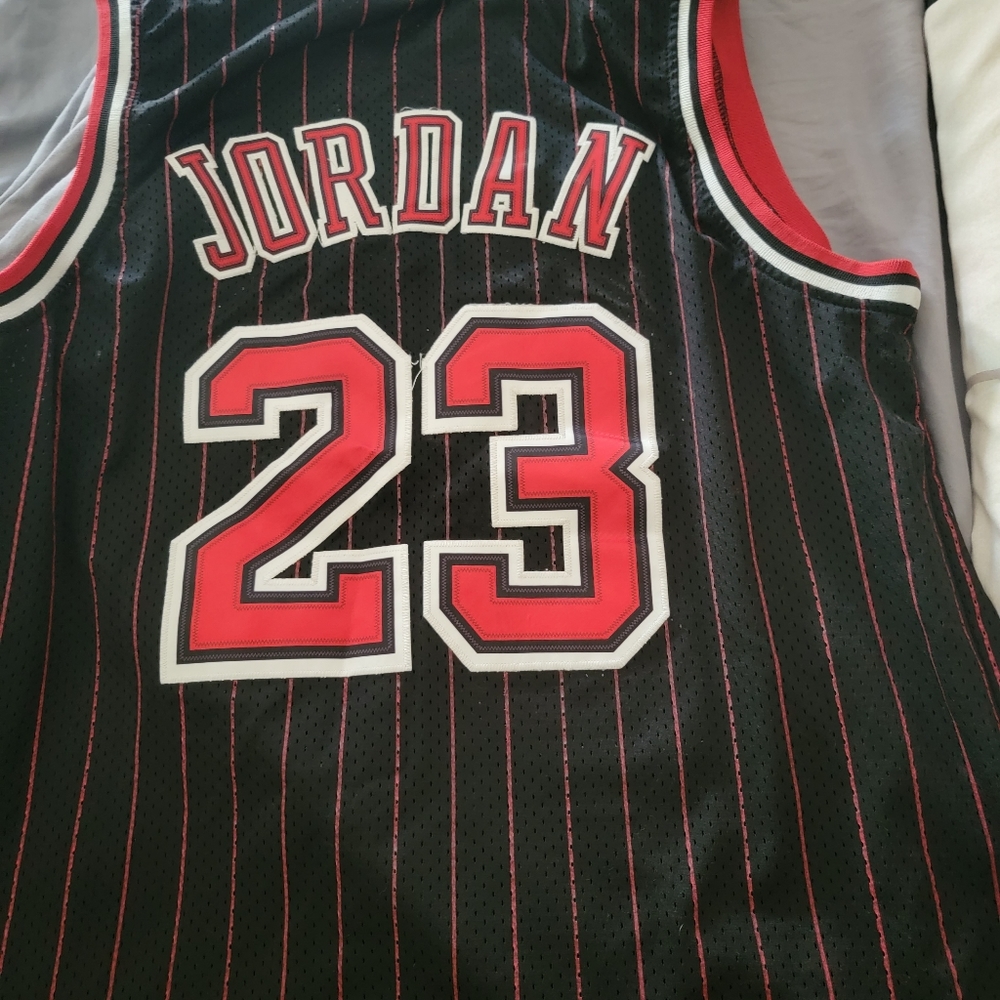 Authentic 100% Michael jordan jersey paid $500 new